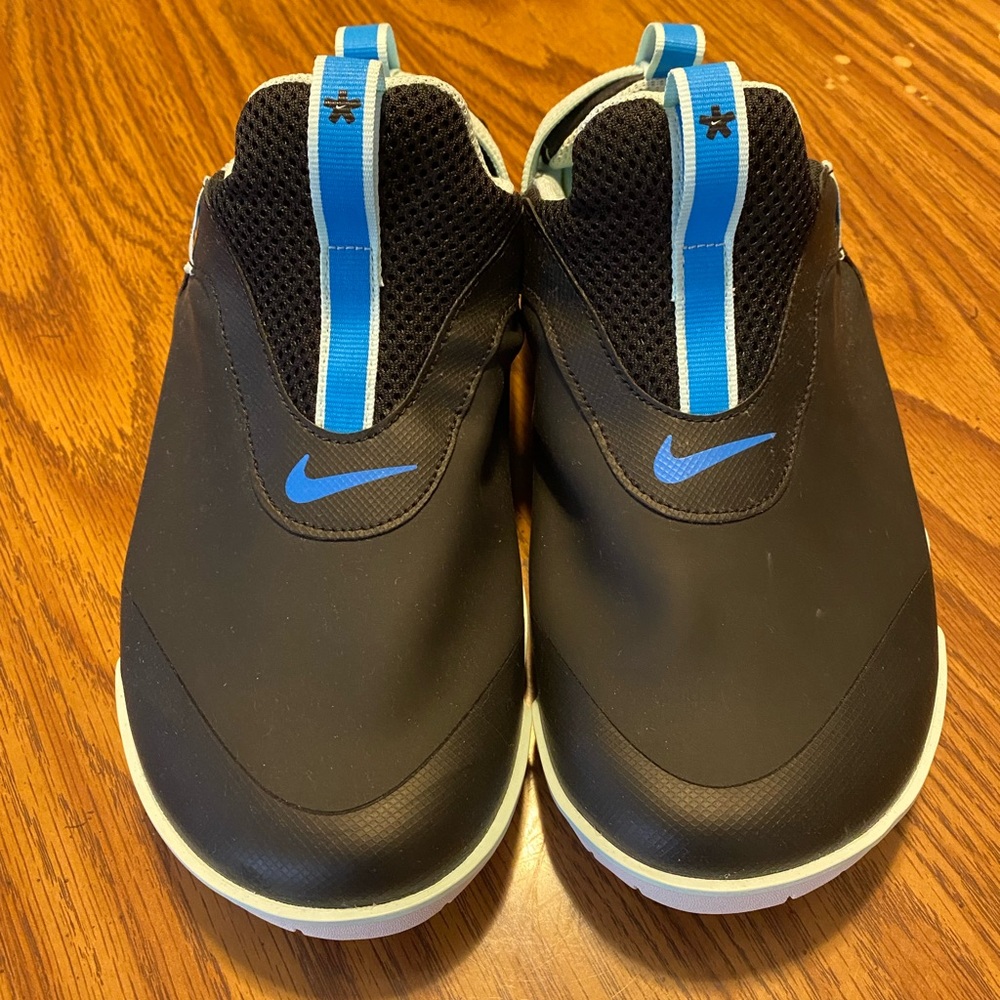 Women’s Nike slip ons. New, never worn.